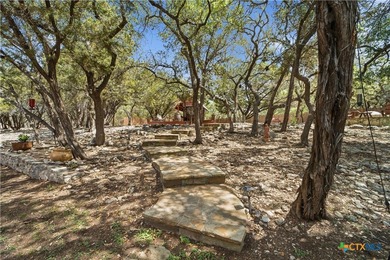 *2.25% Assumable VA loan*Set on 1.5 acres with mature live oaks - photo 30