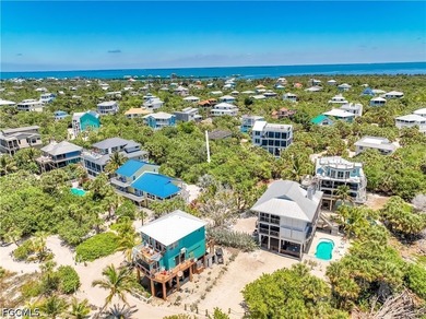 Dock your boat and enjoy water views from an end-unit townhome - photo 49