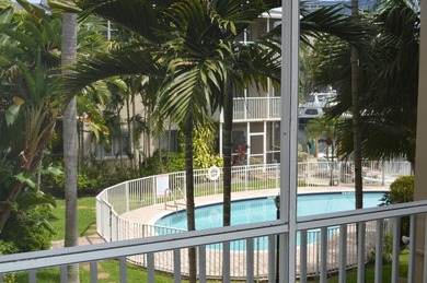 Welcome to Marina del Mar, a charming second-floor condo nestled - photo 13