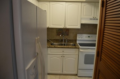 Welcome to Marina del Mar, a charming second-floor condo nestled - photo 16