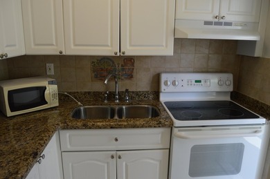 Welcome to Marina del Mar, a charming second-floor condo nestled - photo 17