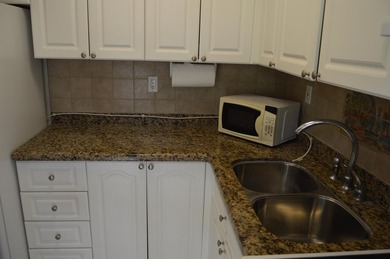 Welcome to Marina del Mar, a charming second-floor condo nestled - photo 19
