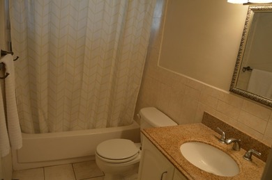 Welcome to Marina del Mar, a charming second-floor condo nestled - photo 25