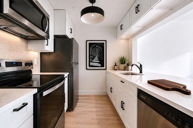 Welcome to 358 Grove Street, a 13-story condominium offering 59 - photo 2