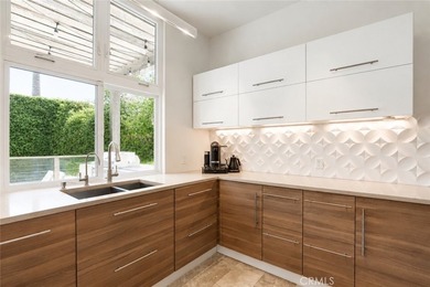 Situated in the coveted Huntington Harbour community, this - photo 15