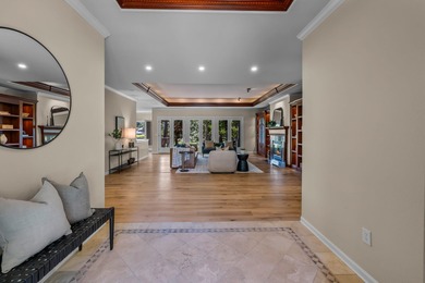Picturesque lake and 17th-fairway views from this beautifully - photo 4
