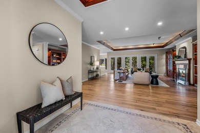 Picturesque lake and 17th-fairway views from this beautifully - photo 5