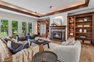 Picturesque lake and 17th-fairway views from this beautifully - photo 6