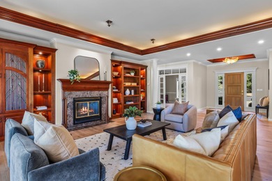 Picturesque lake and 17th-fairway views from this beautifully - photo 9