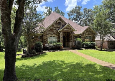 This beautifully-crafted waterfront property resides on Lake - photo 1