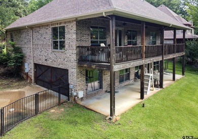 This beautifully-crafted waterfront property resides on Lake - photo 5