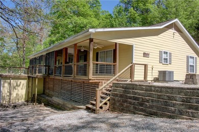 Discover the ultimate lakefront retreat on 3.76 private acres - photo 2