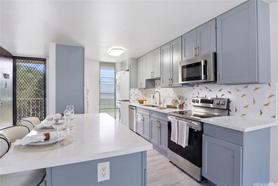 Welcome to this beautifully renovated top-floor condo in the - photo 3