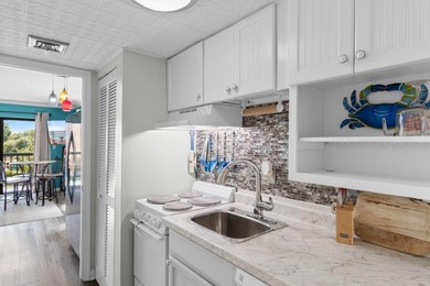 Discover the perfect blend of comfort and coastal charm in this - photo 4