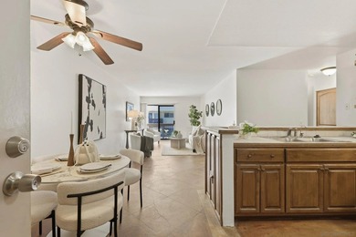 Welcome to this beautifully refreshed ground floor retreat in - photo 2