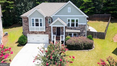 Welcome home to this like-new split-level beauty nestled on a - photo 1