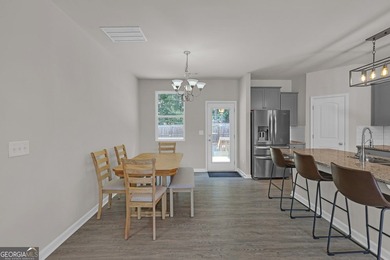 Welcome home to this like-new split-level beauty nestled on a - photo 9