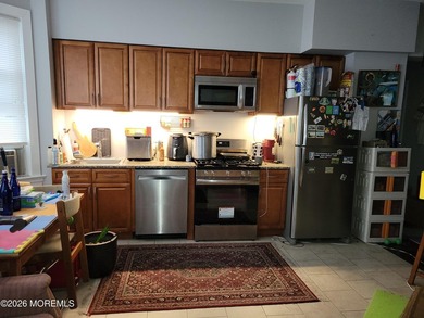 Beautifully renovated and maintained 5-unit apartment building - photo 4