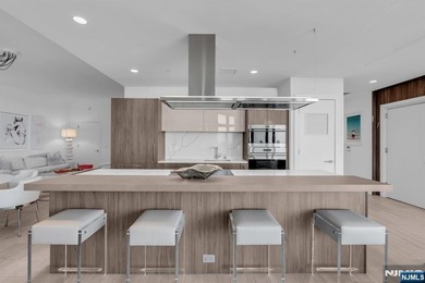 Private elevator entry opens directly into Residence 305, where - photo 10