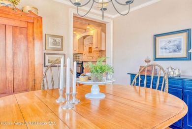 Perched on a commanding 4.5-acre hilltop, this magnificent brick