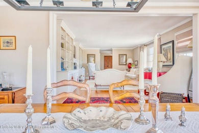 Perched on a commanding 4.5-acre hilltop, this magnificent brick