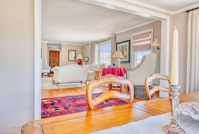 Perched on a commanding 4.5-acre hilltop, this magnificent brick