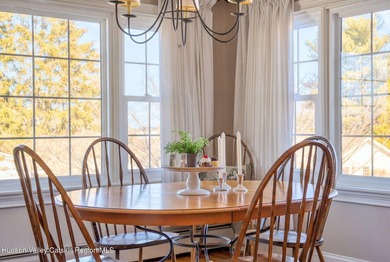 Perched on a commanding 4.5-acre hilltop, this magnificent brick