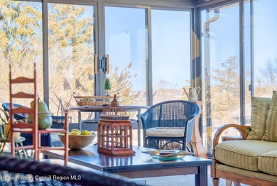 Perched on a commanding 4.5-acre hilltop, this magnificent brick