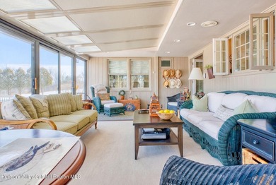 Perched on a commanding 4.5-acre hilltop, this magnificent brick