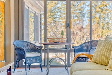 Perched on a commanding 4.5-acre hilltop, this magnificent brick