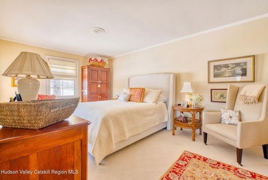 Perched on a commanding 4.5-acre hilltop, this magnificent brick