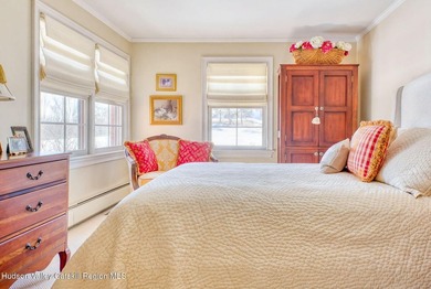 Perched on a commanding 4.5-acre hilltop, this magnificent brick