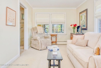 Perched on a commanding 4.5-acre hilltop, this magnificent brick