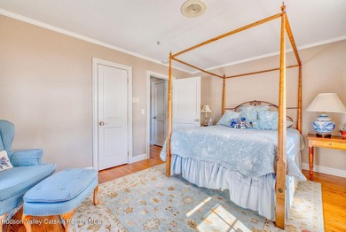 Perched on a commanding 4.5-acre hilltop, this magnificent brick