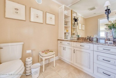 Perched on a commanding 4.5-acre hilltop, this magnificent brick