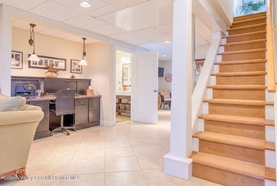 Perched on a commanding 4.5-acre hilltop, this magnificent brick