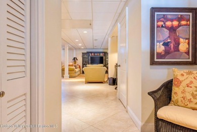 Perched on a commanding 4.5-acre hilltop, this magnificent brick