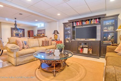 Perched on a commanding 4.5-acre hilltop, this magnificent brick