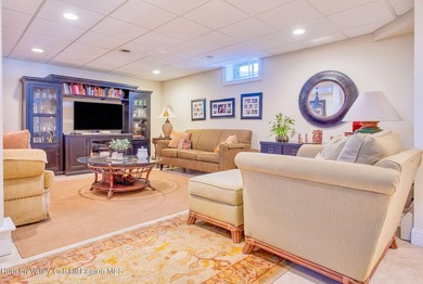 Perched on a commanding 4.5-acre hilltop, this magnificent brick