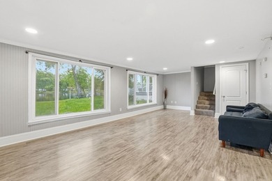 Completely reimagined in 2019, this riverfront retreat blends - photo 6