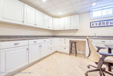 Perched on a commanding 4.5-acre hilltop, this magnificent brick