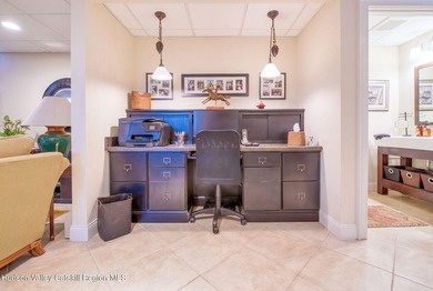 Perched on a commanding 4.5-acre hilltop, this magnificent brick