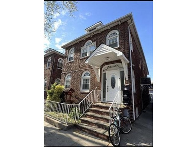 Don't miss this exceptional two-family home in the heart of the - photo 1