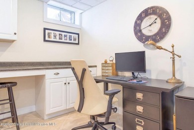 Perched on a commanding 4.5-acre hilltop, this magnificent brick