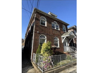 Don't miss this exceptional two-family home in the heart of the - photo 2