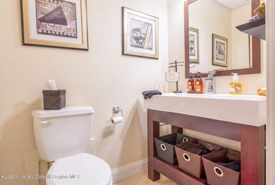 Perched on a commanding 4.5-acre hilltop, this magnificent brick