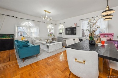 Don't miss this exceptional two-family home in the heart of the - photo 3