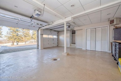 Perched on a commanding 4.5-acre hilltop, this magnificent brick