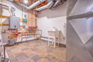 Perched on a commanding 4.5-acre hilltop, this magnificent brick