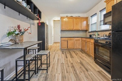 Don't miss this exceptional two-family home in the heart of the - photo 7